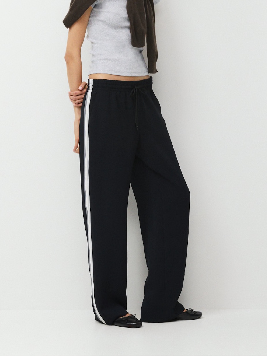 Aritzia Thesis Pants Crepette Black Track Pants With Grey And White Side Stripes